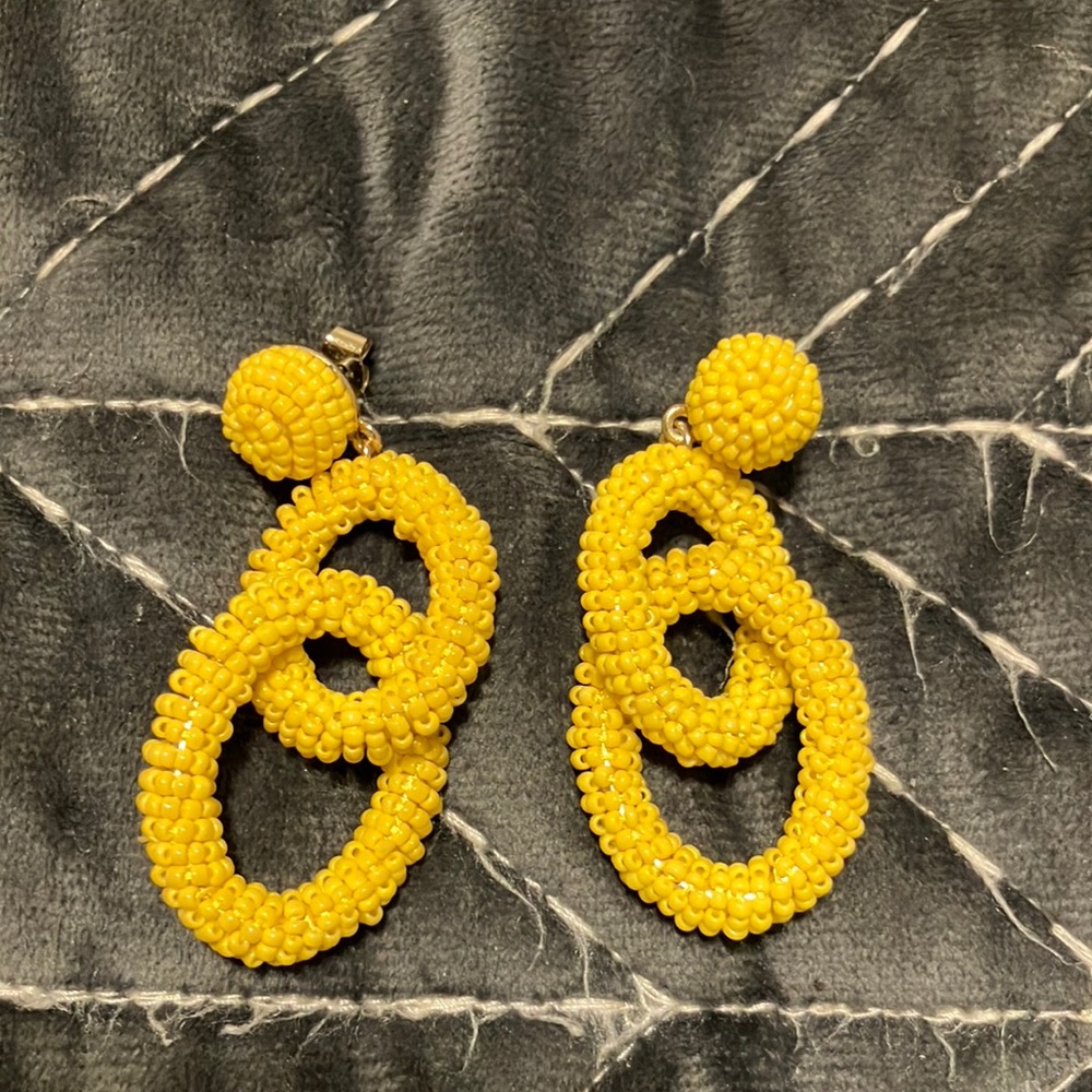 Yellow beaded dangle earrings